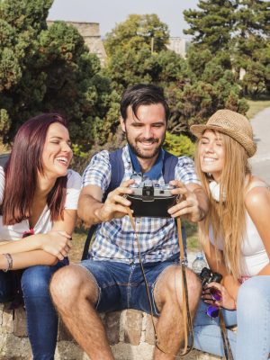 group-happy-friends-taking-photo-camera